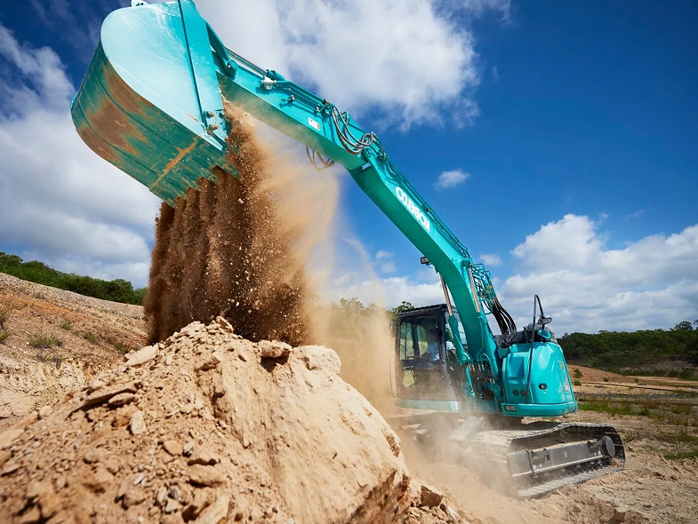 Excavator loading sand